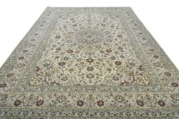 Surface texture of 2000s Kashan rug with natural Wool and intricate pattern