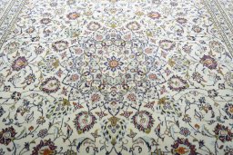 Central medallion detail of 2000s Kashan rug from Iran / Persia
