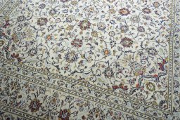 Close-up detail of 2000s Kashan rug from Iran / Persia showing Wool weave