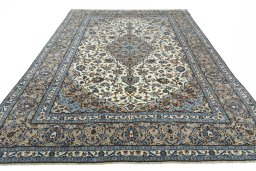 Surface texture of 2000s Kashan rug with natural Wool and intricate pattern