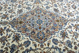 Central medallion detail of 2000s Kashan rug from Iran / Persia