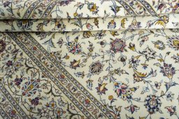 Close-up detail of 2000s Kashan rug from Iran / Persia showing Wool weave