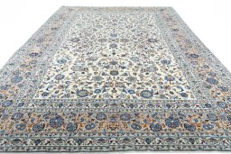 Surface texture of 2000s Kashan rug with natural Wool and intricate pattern
