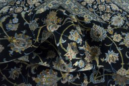 Surface texture of 2000s Kashan rug with natural Wool and intricate pattern