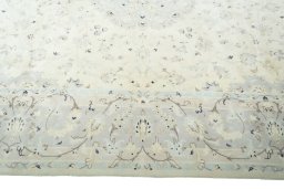 Corner detail of New Kashan rug showing border pattern and Wool pile