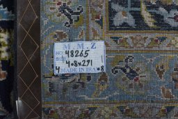 Central medallion detail of 2000s Kashan rug from Iran / Persia
