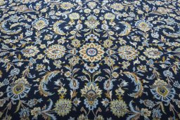 Central medallion detail of 2000s Kashan rug from Iran / Persia
