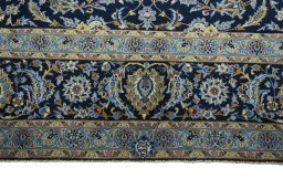 Full view of 2000s Kashan rug from Iran / Persia, 408 × 291 cm in Blue tones