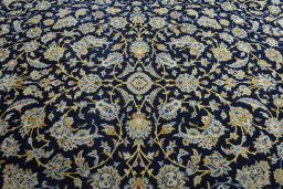Central medallion detail of 2000s Kashan rug from Iran / Persia