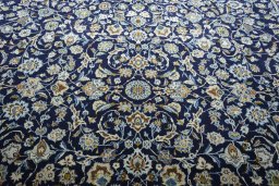 Central medallion detail of 2000s Kashan rug from Iran / Persia