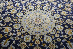 Central medallion detail of 2000s Kashan rug from Iran / Persia