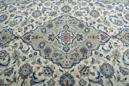 Central medallion detail of 2000s Kashan rug from Iran / Persia