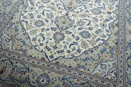 Close-up detail of 2000s Kashan rug from Iran / Persia showing Wool weave
