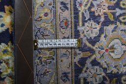 Central medallion detail of 2000s Kashan rug from Iran / Persia