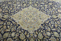 Central medallion detail of 2000s Kashan rug from Iran / Persia