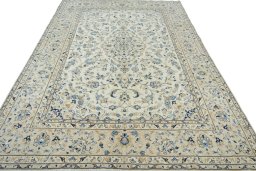 Surface texture of 2000s Kashan rug with natural Wool and intricate pattern