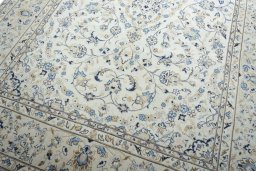 Close-up detail of 2000s Kashan rug from Iran / Persia showing Wool weave