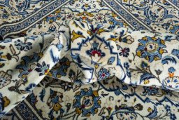 Central medallion detail of 2000s Kashan rug from Iran / Persia