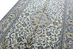 Central medallion detail of 2000s Kashan rug from Iran / Persia