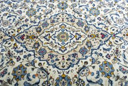 Close-up detail of 2000s Kashan rug from Iran / Persia showing Wool weave
