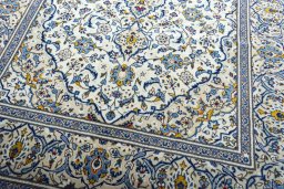 Full view of 2000s Kashan rug from Iran / Persia, 297 × 190 cm in Beige tones