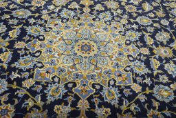 Central medallion detail of 2000s Kashan rug from Iran / Persia