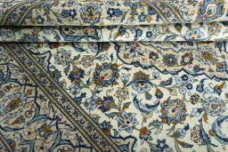 Close-up detail of 2000s Kashan rug from Iran / Persia showing Wool weave