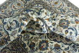 Surface texture of 2000s Kashan rug with natural Wool and intricate pattern