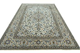 Surface texture of 2000s Kashan rug with natural Wool and intricate pattern