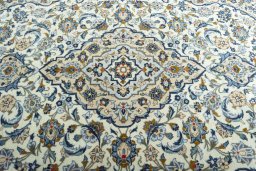 Central medallion detail of 2000s Kashan rug from Iran / Persia