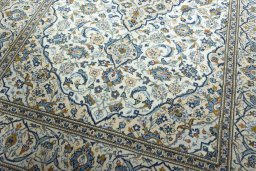 Close-up detail of 2000s Kashan rug from Iran / Persia showing Wool weave