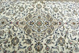 Central medallion detail of 2000s Kashan rug from Iran / Persia