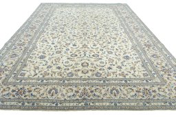 Surface texture of 2000s Kashan rug with natural Wool and intricate pattern