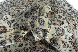 Surface texture of 2000s Kashan rug with natural Wool and intricate pattern
