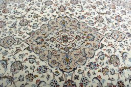 Central medallion detail of 2000s Kashan rug from Iran / Persia