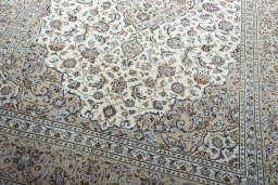 Close-up detail of 2000s Kashan rug from Iran / Persia showing Wool weave