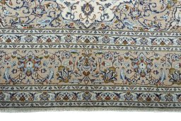 Full view of 2000s Kashan rug from Iran / Persia, 337 × 245 cm in Beige tones