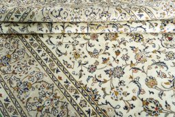 Close-up detail of 2000s Kashan rug from Iran / Persia showing Wool weave