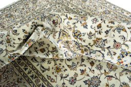 Surface texture of 2000s Kashan rug with natural Wool and intricate pattern