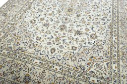Close-up detail of 2000s Kashan rug from Iran / Persia showing Wool weave