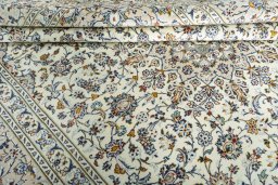 Close-up detail of 2000s Kashan rug from Iran / Persia showing Wool weave