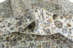 Surface texture of 2000s Kashan rug with natural Wool and intricate pattern