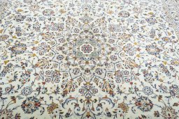 Central medallion detail of 2000s Kashan rug from Iran / Persia
