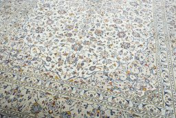 Close-up detail of 2000s Kashan rug from Iran / Persia showing Wool weave