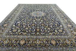 Surface texture of 2000s Kashan rug with natural Wool and intricate pattern