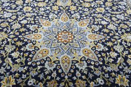 Central medallion detail of 2000s Kashan rug from Iran / Persia