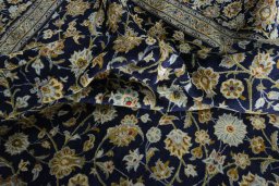 Surface texture of 2000s Kashan rug with natural Wool and intricate pattern