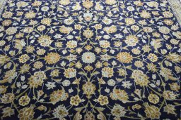 Central medallion detail of 2000s Kashan rug from Iran / Persia