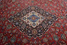 Central medallion detail of 2000s Kashan rug from Iran / Persia