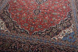 Close-up detail of 2000s Kashan rug from Iran / Persia showing Wool weave